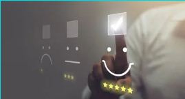 Image shows a customer selecting a 5 star rating, happy face icon on a touch screen